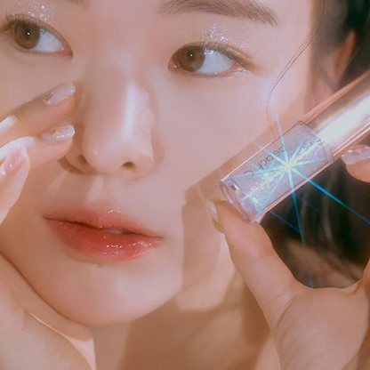Peach C - Champagne Eye Glitter - high-impact eye glitter - long-lasting adherence - non-irritating formula on top of holographic glow