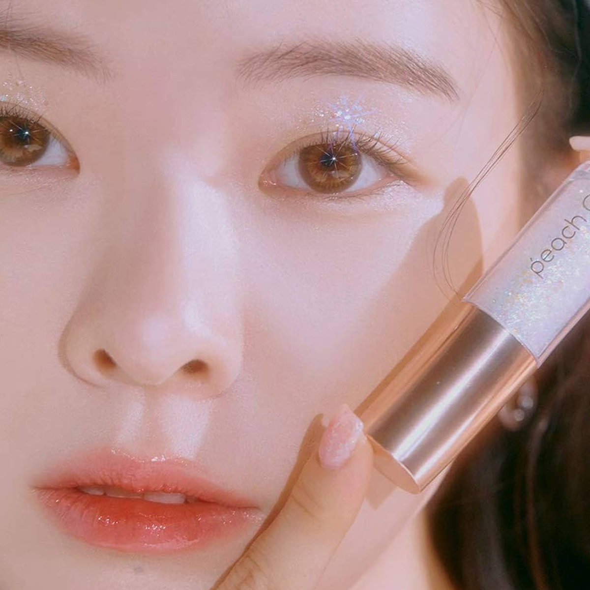 Peach C - Champagne Eye Glitter - high-impact eye glitter - long-lasting adherence - non-irritating formula on top of holographic glow